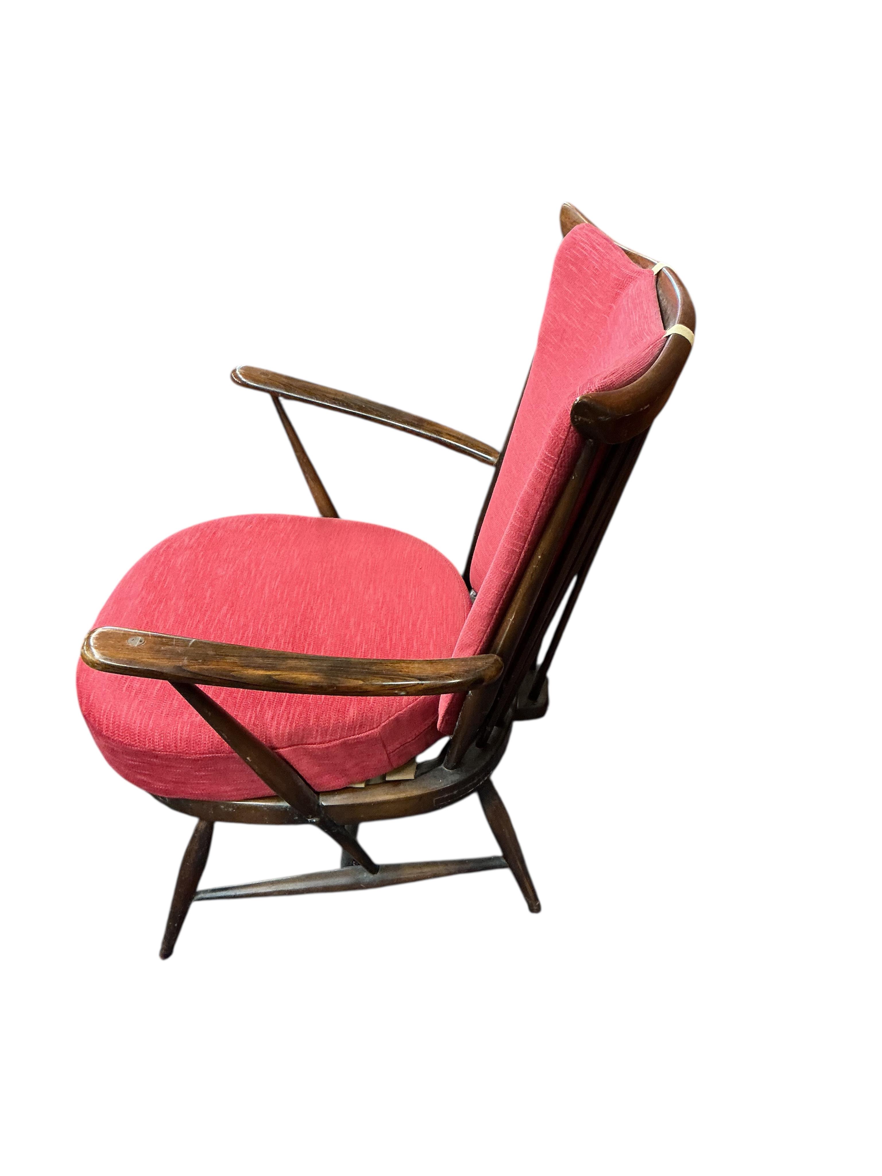 A pair of Ercol armchairs, width 70cm, depth 60cm, height 86cm